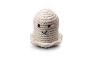 Cream crochet ghost keyring charm with a stitched smile and pink cheeks