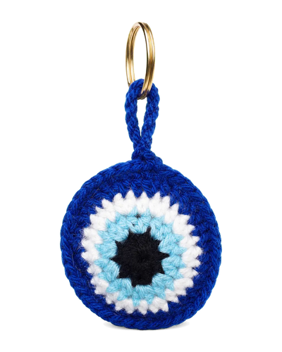 Royal blue crochet evil eye keychain with white and sky blue rings on a gold key ring