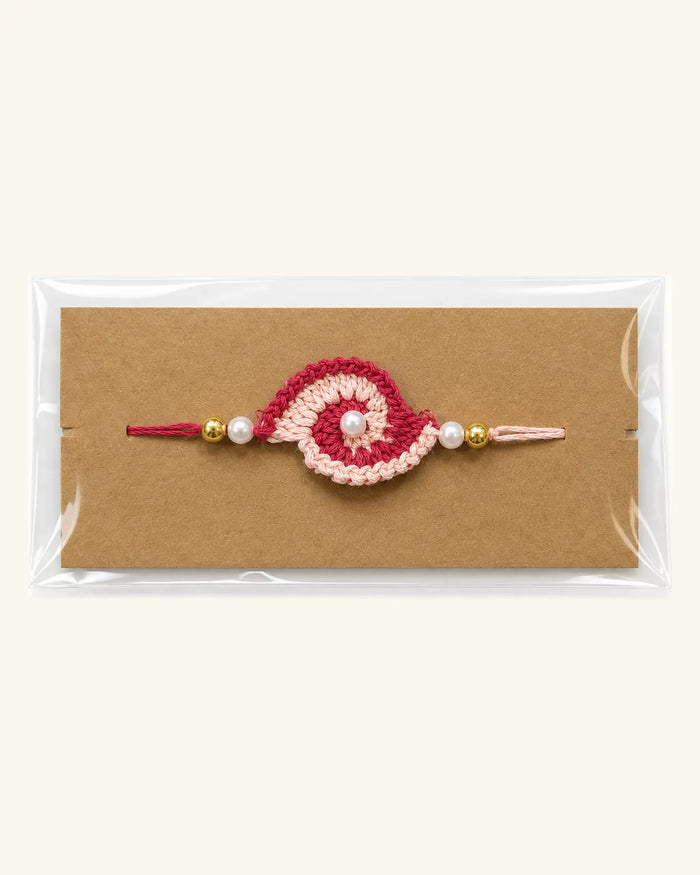 Pink and Beige Swirl Crochet Rakhi