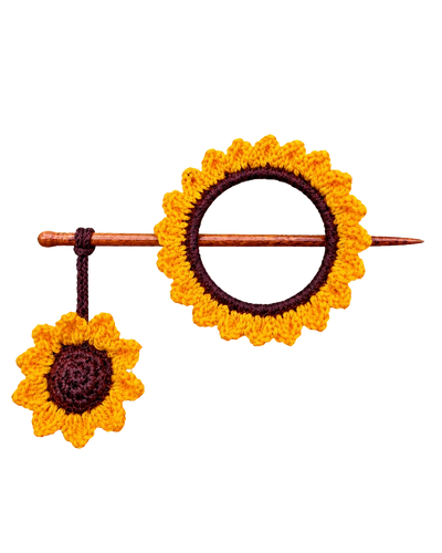 Sunflower Juda Stick, a crochet sunflower bun holder with a wooden stick
