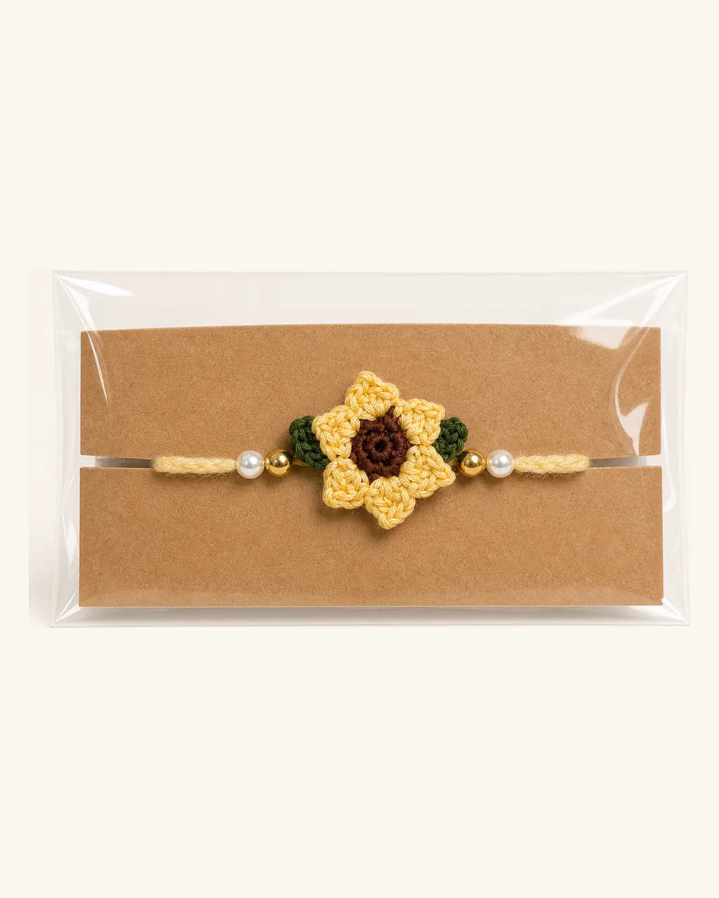 Sunflower Crochet Rakhi in its gift sleeve