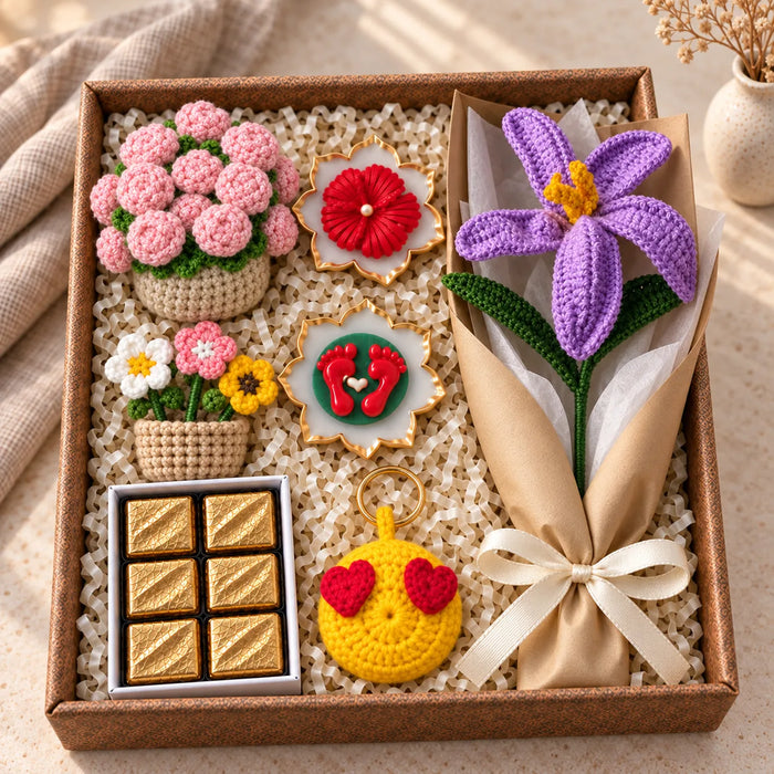 Chai Pe Festive Hamper box: purple crochet lily, pink rose coaster set, heart-eyes keyring, chocolates, diya urlis