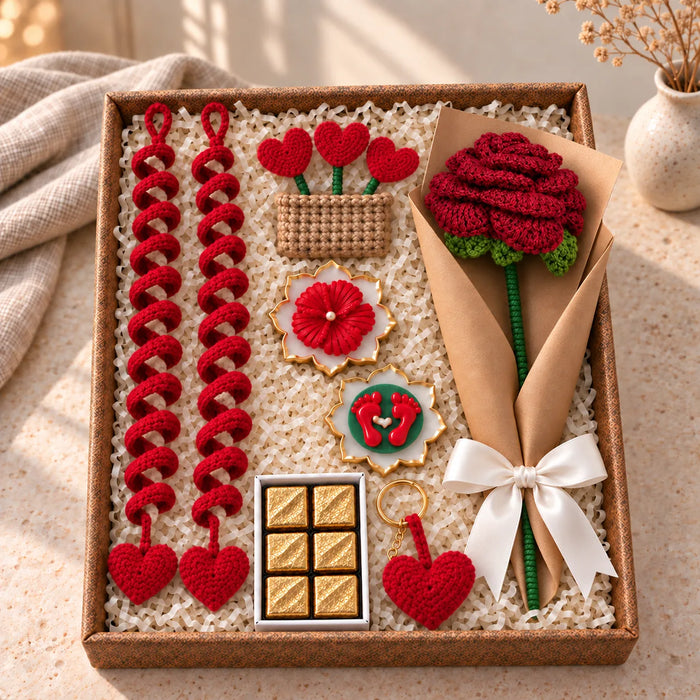 Dilwali Festive Hamper box: red crochet rose, two red heart spiral hangings, heart keyring, chocolates, diya urlis