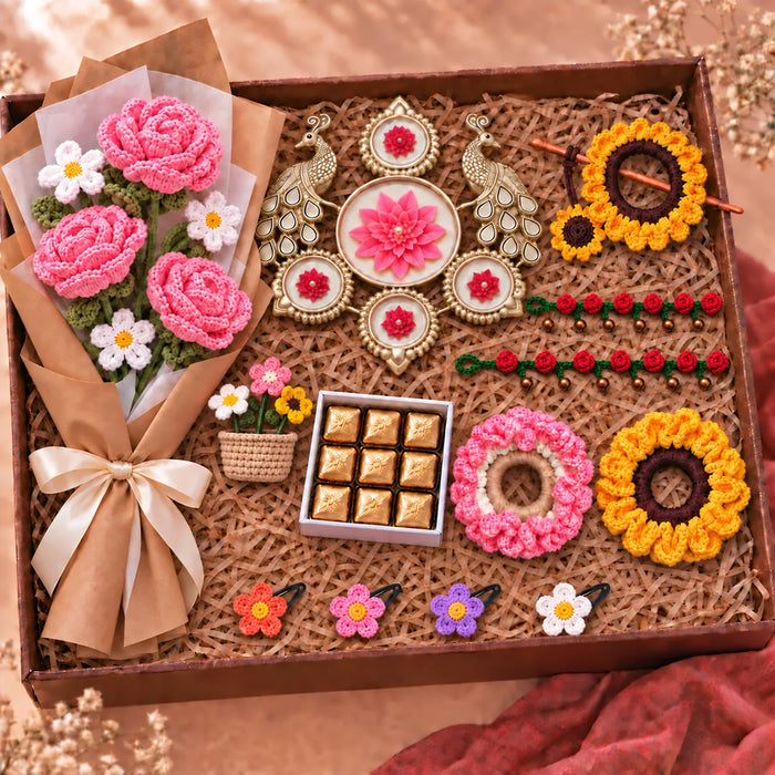 Pretty Patakha Hamper box: pink crochet rose bouquet, peacock diya urli, scrunchies, payals, hairpins, chocolates